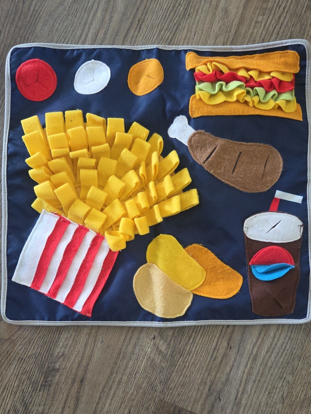 Interactive Navy Blue Plush Dog Treat Mat with Yellow Fry Design
